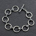 Men's Sterling Silver Skull and Ring Link Bracelet