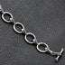 Men's Sterling Silver Skull and Ring Link Bracelet